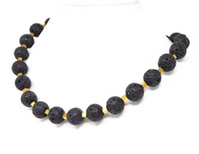 Load image into Gallery viewer, ELISA | Schöne Gem.Chic Unikat Halskette aus Lava in Kugelform mit goldfarbenen Zwischenteilen aus Pyrit
